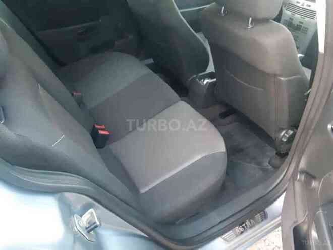 Opel Astra 2009, 242,500 km - 1.6 l - Bakı