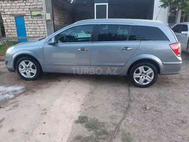 Opel Astra 2009, 242,500 km - 1.6 l - Bakı