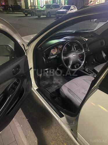 Nissan Sunny 2003, 325,000 km - 1.3 л - Bakı