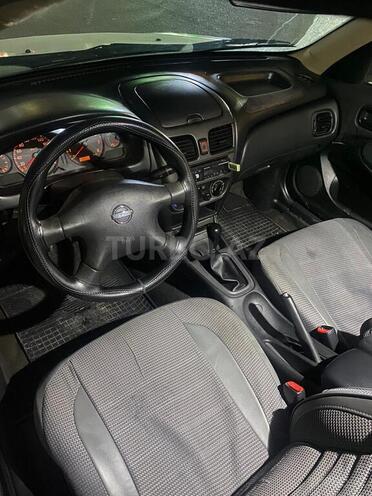 Nissan Sunny 2003, 325,000 km - 1.3 л - Bakı