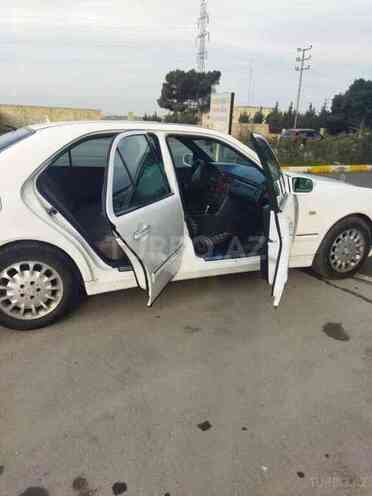 Mercedes E 220 1997, 303,800 km - 2.2 л - Bakı