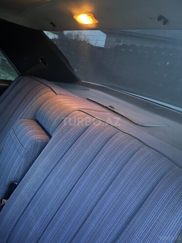 Mercedes E 200 1989, 242,300 km - 2.0 l - Bakı