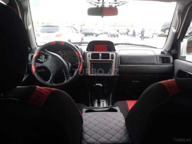 Mitsubishi Pajero io 1999, 300,500 km - 1.8 l - Bakı
