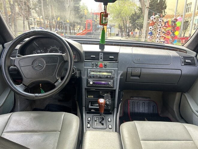 Mercedes E 230 1997, 370,244 km - 2.3 l - Bakı