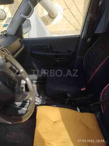 Mitsubishi Pajero io 2001, 295,000 km - 2.0 l - Bakı