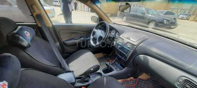 Nissan Sunny 2004, 189,000 km - 1.6 l - Bakı