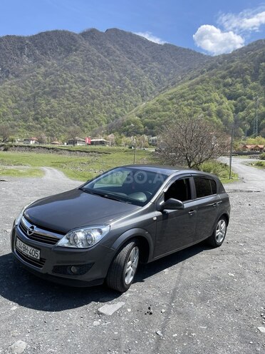 Opel Astra 2010, 125,000 km - 1.4 л - Qax