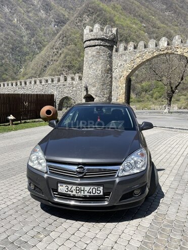 Opel Astra 2010, 125,000 km - 1.4 л - Qax