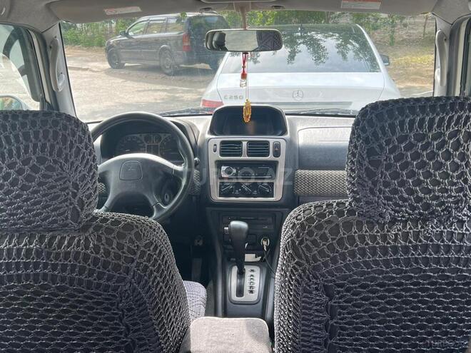 Mitsubishi Pajero io 1999, 322,117 km - 1.8 l - Sumqayıt