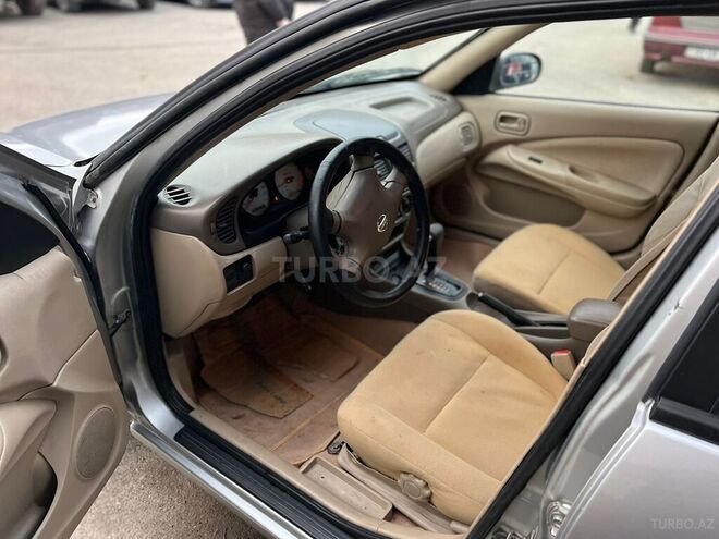 Nissan Sunny 2004, 230,000 km - 1.3 l - Bakı