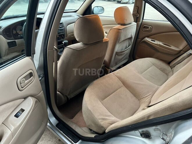 Nissan Sunny 2004, 230,000 km - 1.3 l - Bakı