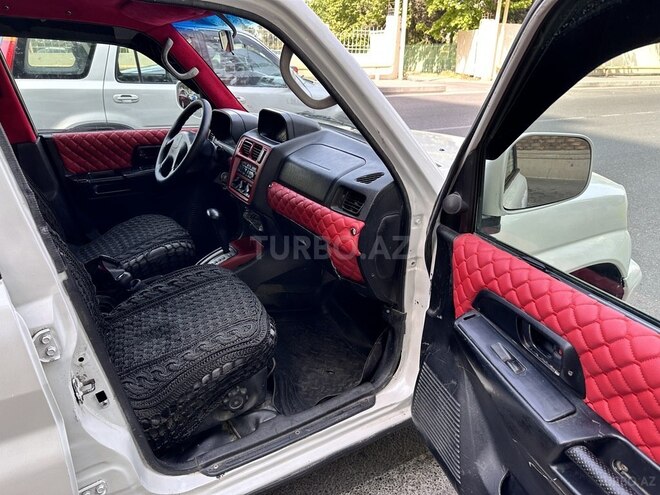 Mitsubishi Pajero io 1999, 285,000 km - 1.8 l - Bakı
