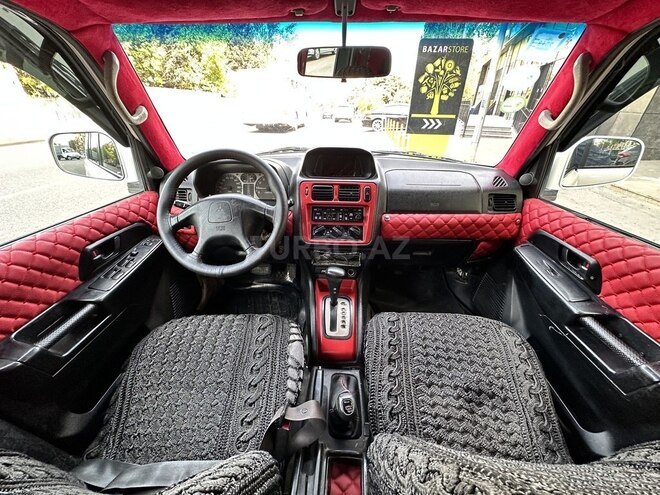 Mitsubishi Pajero io 1999, 285,000 km - 1.8 l - Bakı