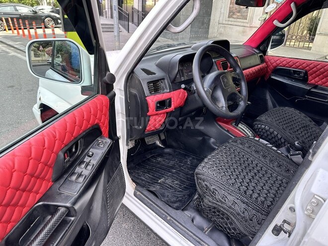 Mitsubishi Pajero io 1999, 285,000 km - 1.8 l - Bakı