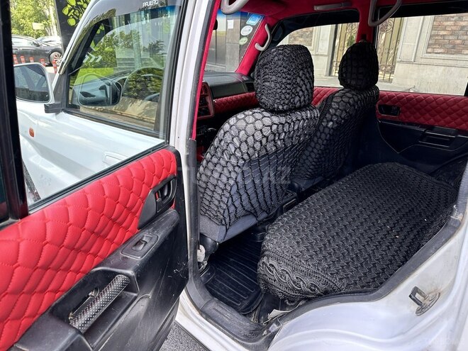 Mitsubishi Pajero io 1999, 285,000 km - 1.8 l - Bakı