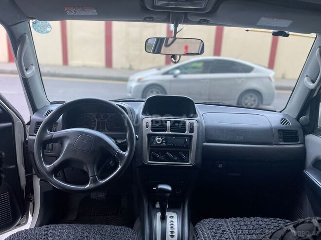 Mitsubishi Pajero io 1999, 390,000 km - 1.8 l - Bakı