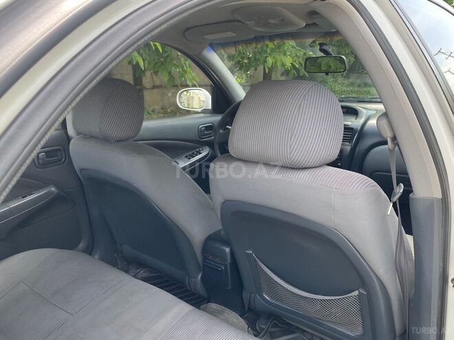 Nissan Sunny 2006, 128,000 km - 1.6 l - Quba