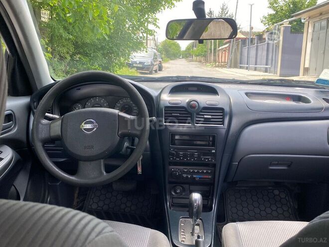 Nissan Sunny 2006, 128,000 km - 1.6 l - Quba