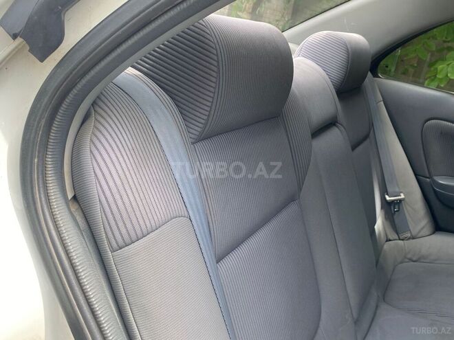 Nissan Sunny 2006, 128,000 km - 1.6 l - Quba