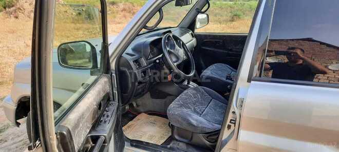 Mitsubishi Pajero io 1999, 235,000 km - 1.8 л - Sumqayıt