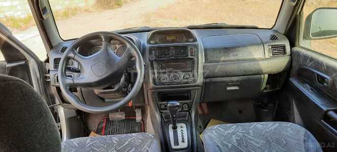 Mitsubishi Pajero io 1999, 235,000 km - 1.8 л - Sumqayıt