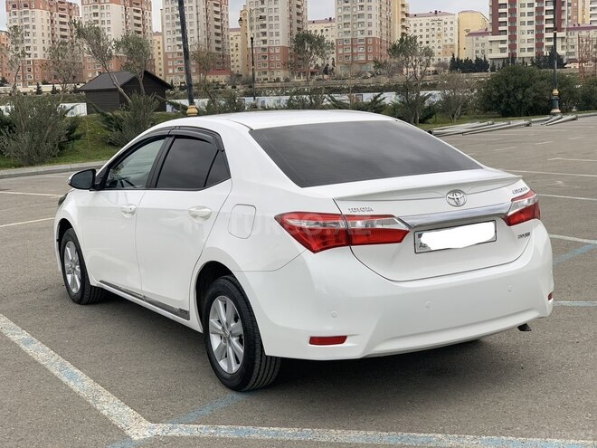 Toyota Corolla 2014, 173,000 km - 1.6 l - Bakı
