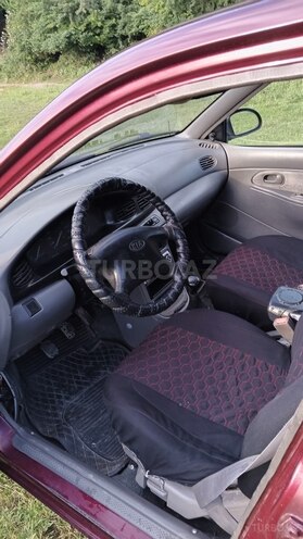 Kia  1999, 266,415 km - 1.5 л - Quba