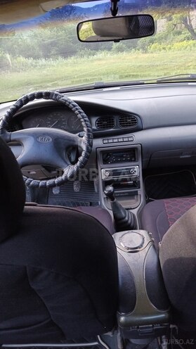 Kia  1999, 266,415 km - 1.5 л - Quba