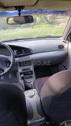 Kia  1999, 266,415 km - 1.5 л - Quba