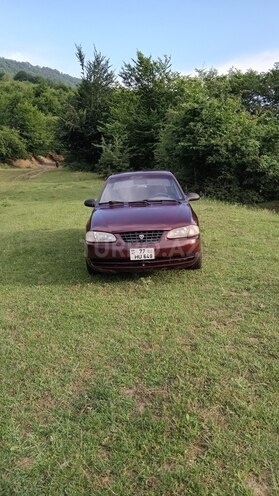 Kia  1999, 266,415 km - 1.5 л - Quba
