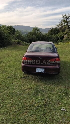 Kia  1999, 266,415 km - 1.5 л - Quba