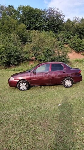 Kia  1999, 266,415 km - 1.5 л - Quba