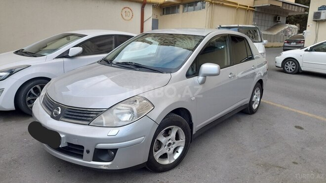 Nissan Tiida 2007, 250,000 km - 1.5 l - Quba