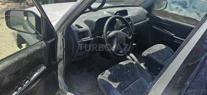 Mitsubishi Pajero io 1999, 252,525 km - 2.0 л - Sumqayıt