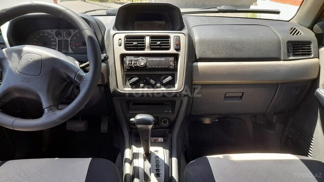 Mitsubishi Pajero io 1999, 300,000 km - 1.8 l - Bakı