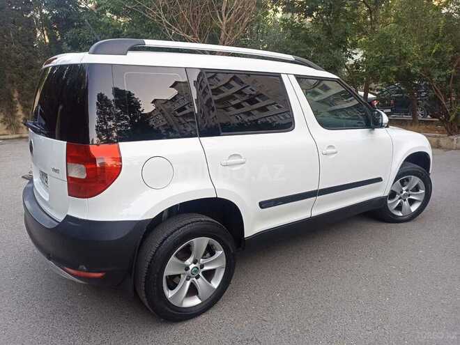 Skoda Yeti 2012, 300,236 km - 1.2 l - Bakı