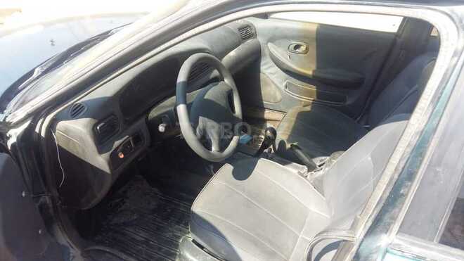 Kia Clarus 1999, 252,525 km - 2.0 l - Sumqayıt