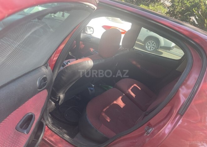 Peugeot 206 2005, 247,000 km - 1.6 l - Bakı