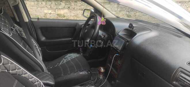 Opel Astra 1998, 441,115 km - 1.8 л - Qax