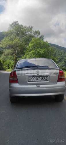 Opel Astra 1998, 441,115 km - 1.8 л - Qax