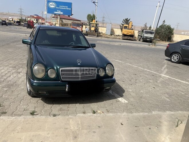 Mercedes E 230 1997, 256,052 km - 2.3 l - Bakı