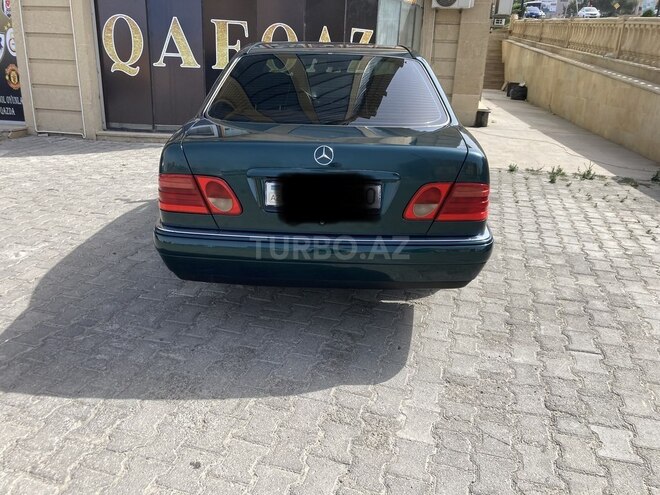 Mercedes E 230 1997, 256,052 km - 2.3 l - Bakı