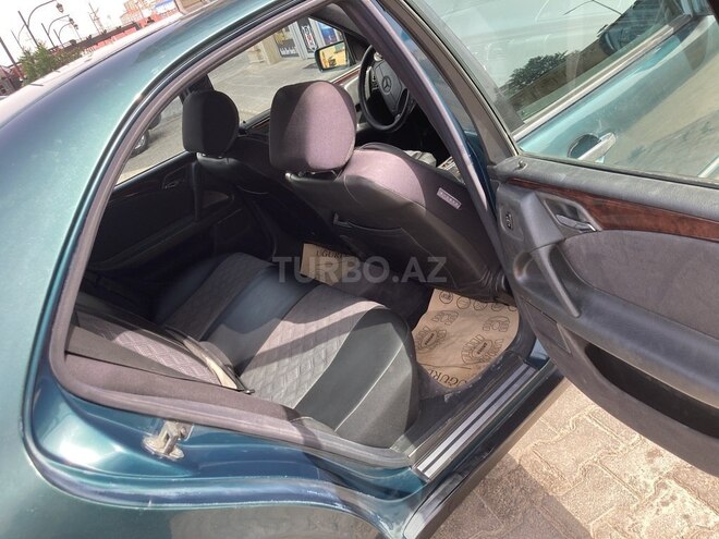 Mercedes E 230 1997, 256,052 km - 2.3 l - Bakı