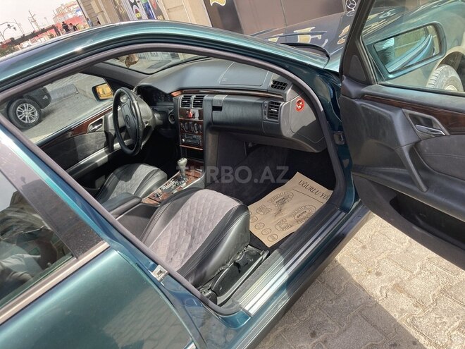 Mercedes E 230 1997, 256,052 km - 2.3 l - Bakı