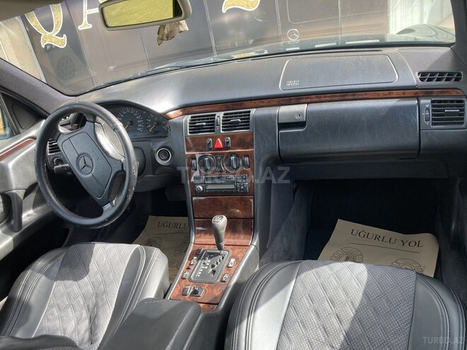 Mercedes E 230 1997, 256,052 km - 2.3 l - Bakı