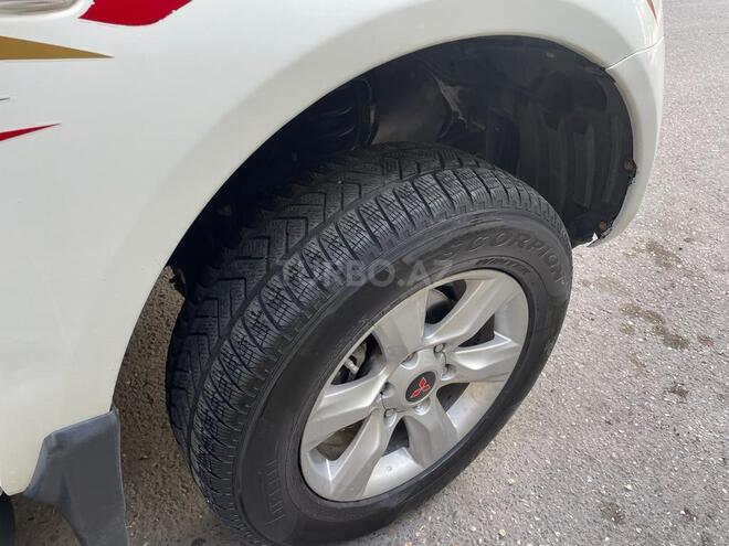 Mitsubishi L200 2013, 22,000 km - 2.5 l - Bakı