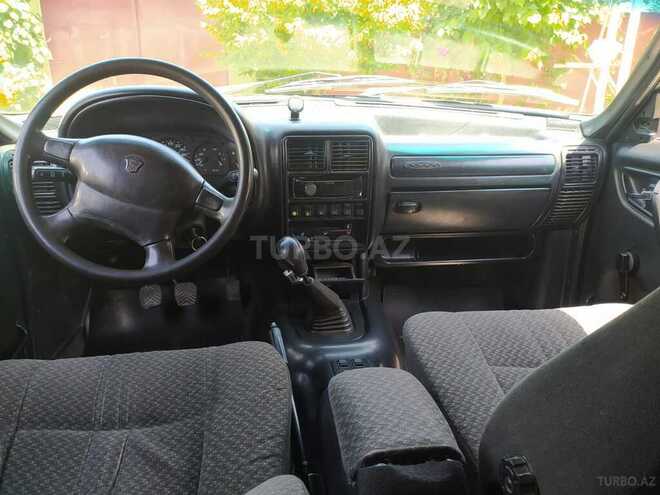 GAZ 3110 2001, 401,000 km - 2.3 л - Astara