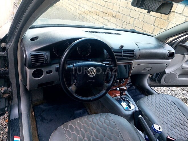 Volkswagen Passat 2003, 397,419 km - 1.8 l - Quba