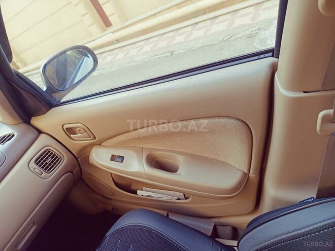 Nissan Sunny 2006, 325,000 km - 1.6 l - Bakı