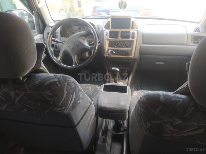 Mitsubishi Pajero io 1999, 229,928 km - 1.8 l - Bakı